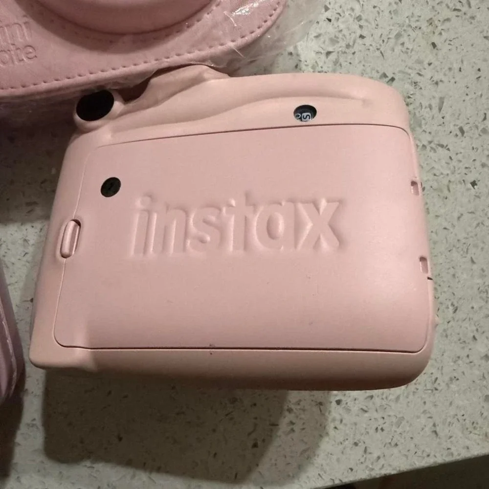 Pink Instax Mini 9 camera with 2 case and strap no‎ battery cover